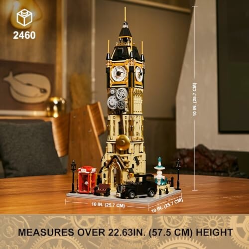 Lego model of Big Ben with detailed features, including clock face and miniature vehicles, measuring over 22 inches tall.